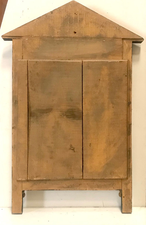 Miroir en bois doré et teinté de style Empire XIXème 