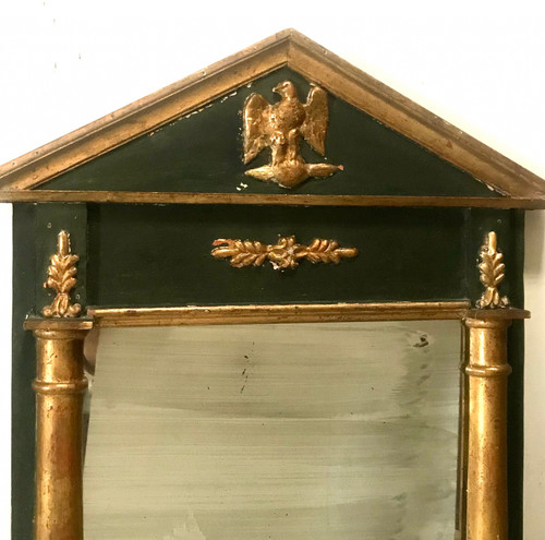 Miroir en bois doré et teinté de style Empire XIXème 