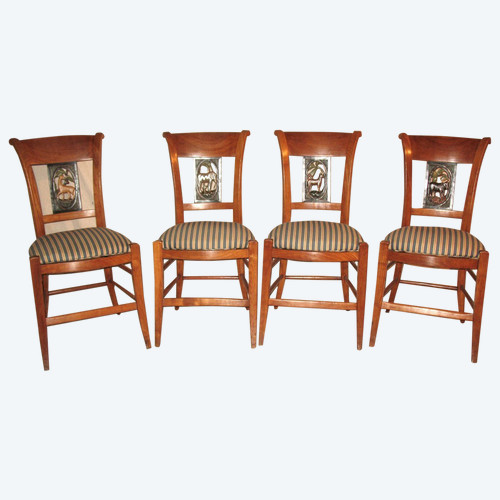 Suite of 4 chairs in cherry wood decorated with animals from the 4 continents