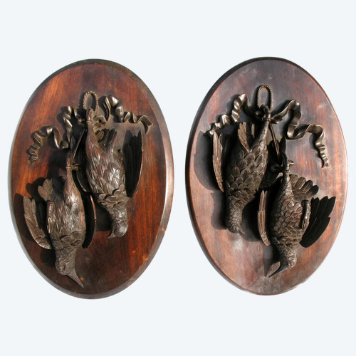 Pair of hunting trophies in carved wood from the Black Forest, 19th century