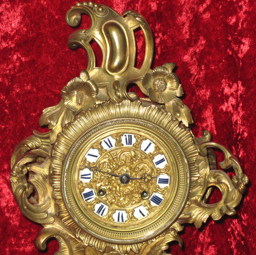 Cartel in bronze 19th century Rocaille style with cherub