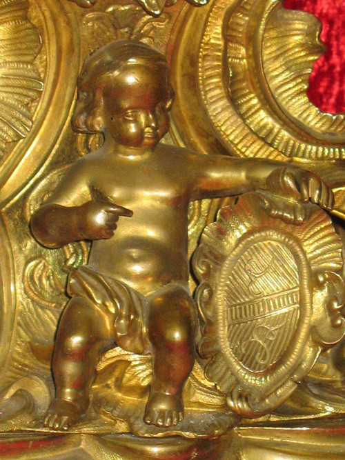 Cartel in bronze 19th century Rocaille style with cherub