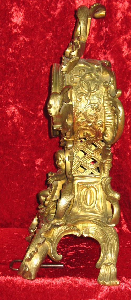Cartel in bronze 19th century Rocaille style with cherub