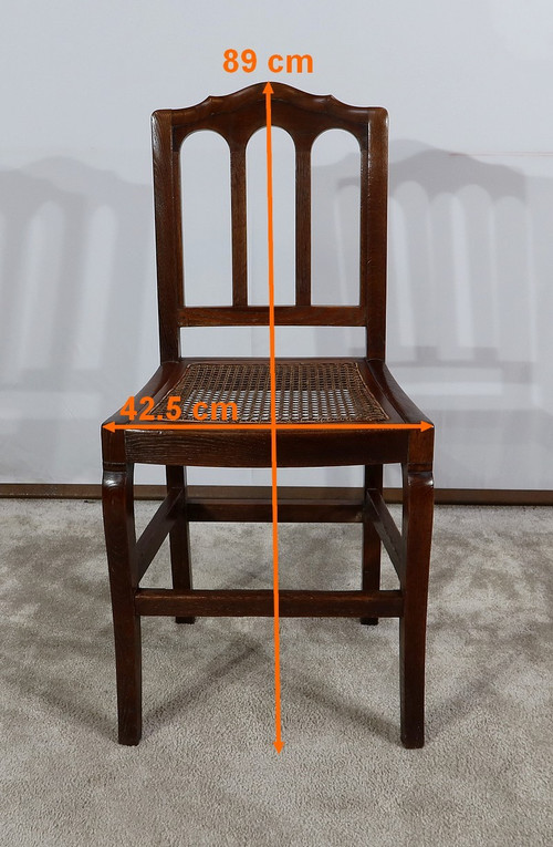Suite de 4 chaises en chêne massif – 2ème moitié XIXe