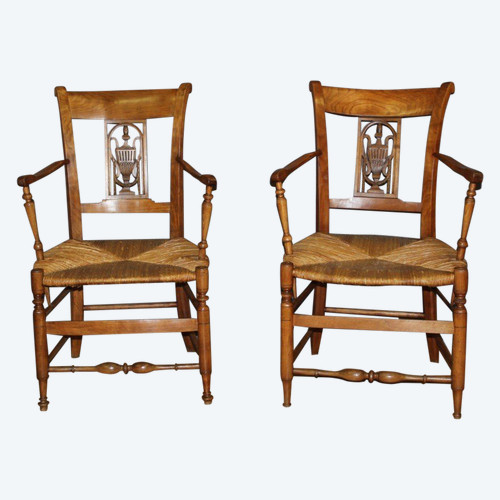 Pairs of Directoire straw-covered armchairs, early 19th century