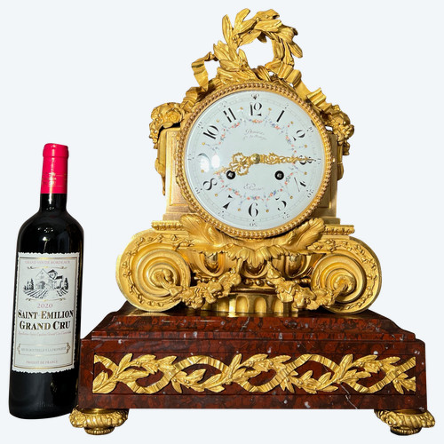 Important Louis XVI style Napoleon III period Griotte Red Marble and gilt bronze clock