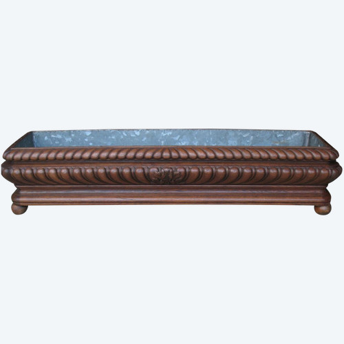 Large, long planter complete with zinc interior from the 19th century in the Louis XIII style