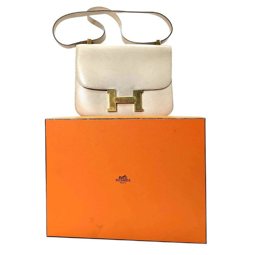 Hermès Damenhandtasche aus cremefarbenem Leder, Modell Constance