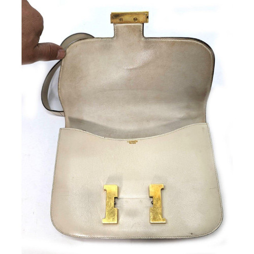 Hermès Damenhandtasche aus cremefarbenem Leder, Modell Constance