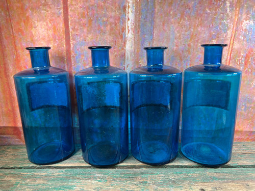 Set mit 4 alten blauen Apothekenflaschen um 1860