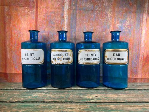 Set mit 4 alten blauen Apothekenflaschen um 1860