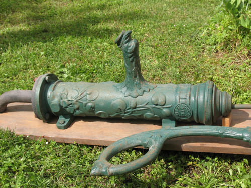 Cast iron water pump, 19th century, Chappée brand, decorated with dolphin and plants h: 140 cm