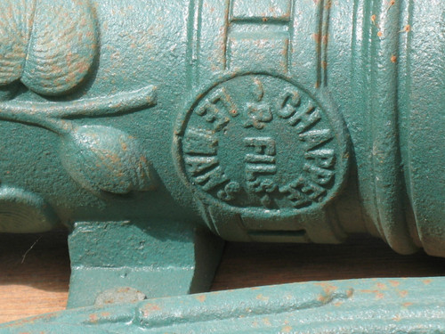 Cast iron water pump, 19th century, Chappée brand, decorated with dolphin and plants h: 140 cm