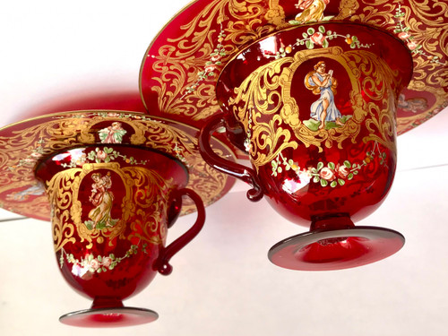 Pair of cups and saucers in ruby red enamelled Venetian glass