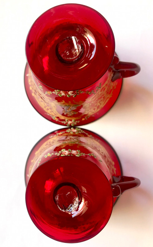 Pair of cups and saucers in ruby red enamelled Venetian glass