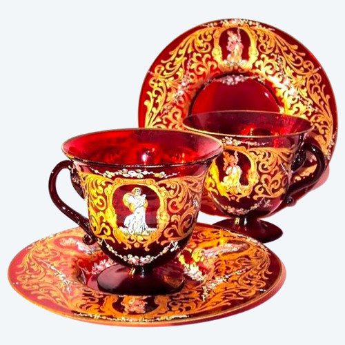 Pair of cups and saucers in ruby red enamelled Venetian glass
