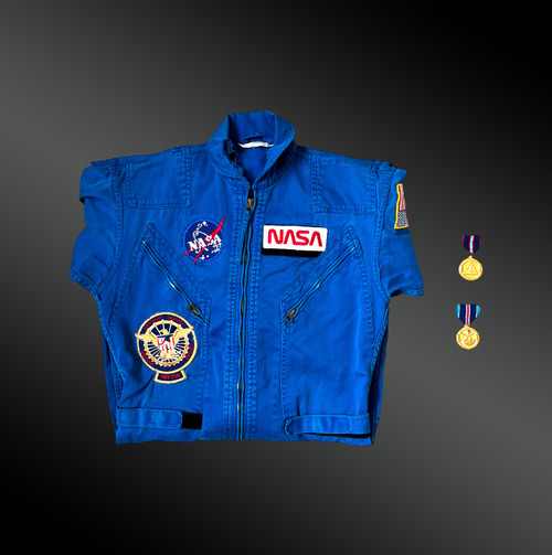 TUTA DA ASTRONAUTA DELLA NASA Precedentemente di proprietà dell'astronauta americano James F. Buchli