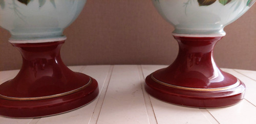 Pair of Napoleon 3 vases in porcelain with basket and butterfly decor, height 33 cm