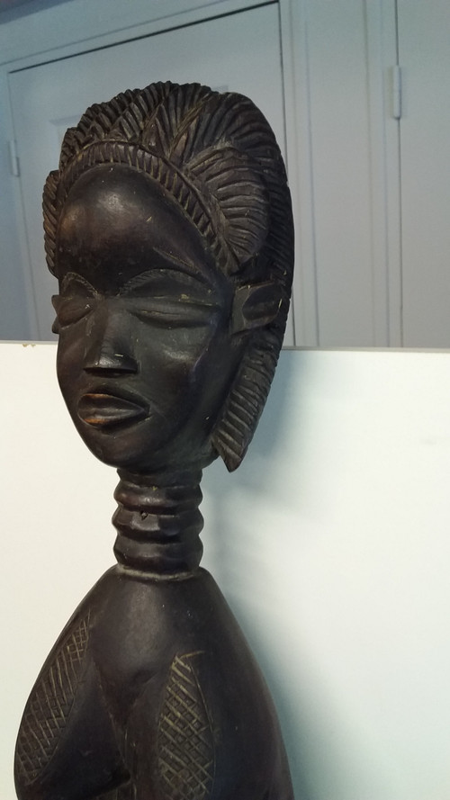 Cucchiaio cerimoniale Wakémia decorato con una testa di donna liberiana