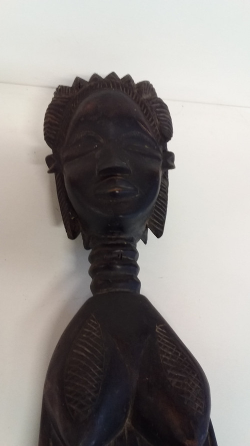 Cucchiaio cerimoniale Wakémia decorato con una testa di donna liberiana