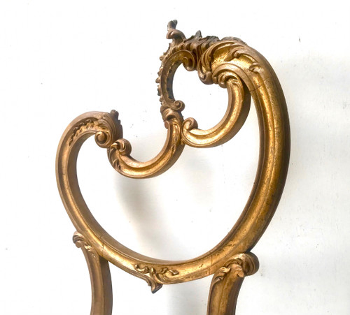 Louis XV Rocaille style chair in gilded wood