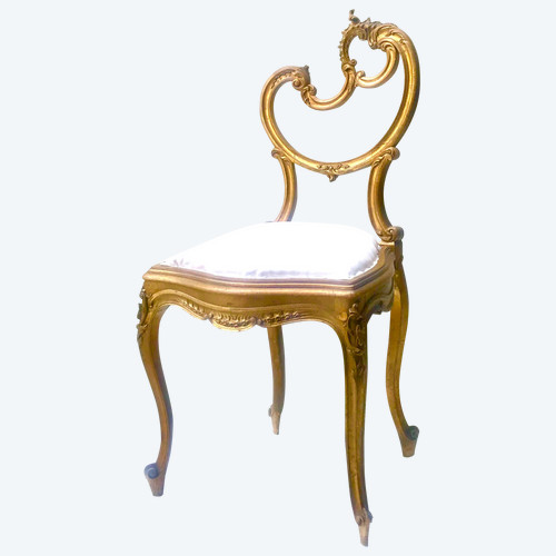 Louis XV Rocaille style chair in gilded wood
