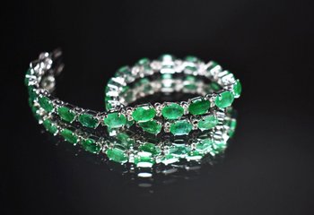 Bracciale in oro con smeraldi e diamanti