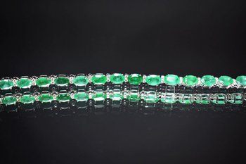 Bracciale in oro con smeraldi e diamanti