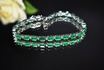 Bracciale in oro con smeraldi e diamanti