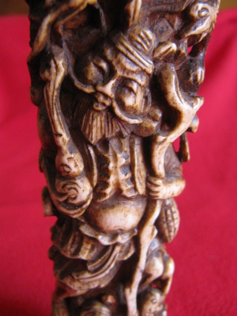 Chinese bone sculpture on blackened wooden base late 19th