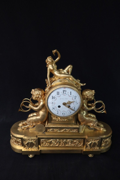 Orologio con putti musicanti in bronzo dorato XIX secolo