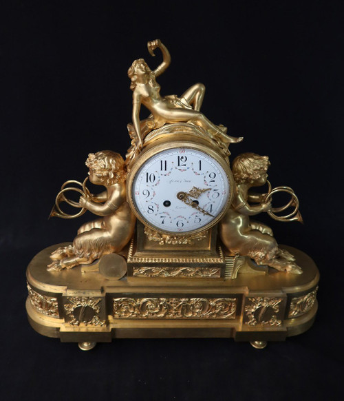 Orologio con putti musicanti in bronzo dorato XIX secolo