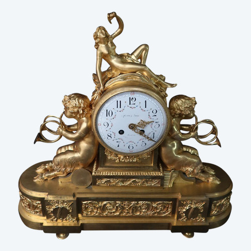 Orologio con putti musicanti in bronzo dorato XIX secolo