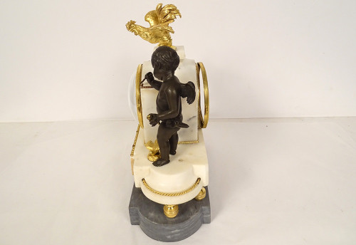 Pendulum in Gilt Bronze and Turquin Carrara Marble "Warrior Loves" Cupid XVIII