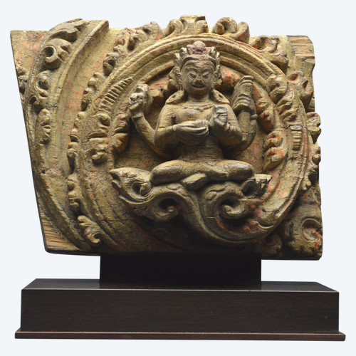 Nepal, 14th-15th century, Solid wood panel representing Vishnu's shakti