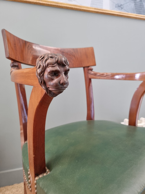P.MARCION stamped: Officer's armchair in mahogany, Consulate-Empire period.