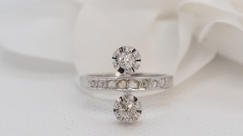 Anello in oro bianco, platino e diamanti