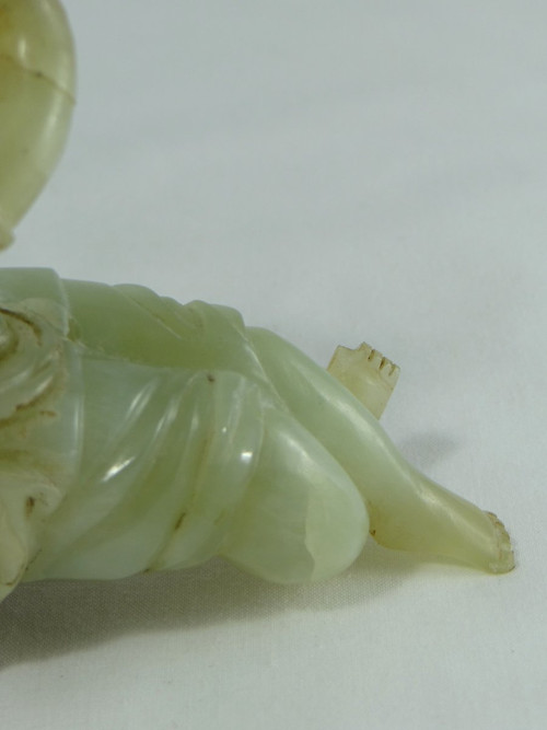 China Circa 1900, Jade Sculpture of a Child Playing the Flute.