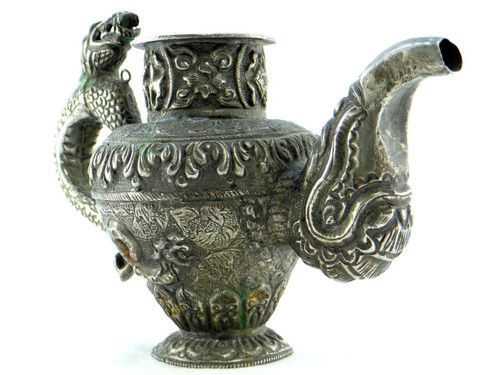 Tibet, Early 20th Century, Repoussé Silver Teapot.