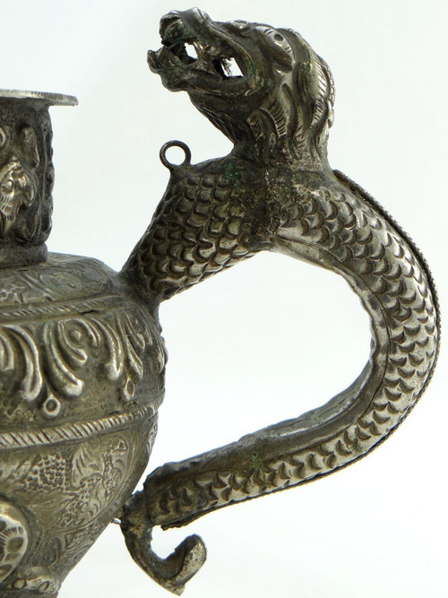 Tibet, Early 20th Century, Repoussé Silver Teapot.
