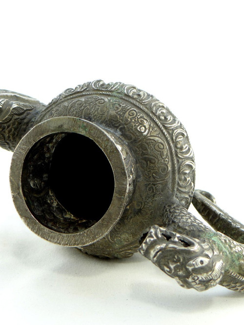 Tibet, Early 20th Century, Repoussé Silver Teapot.