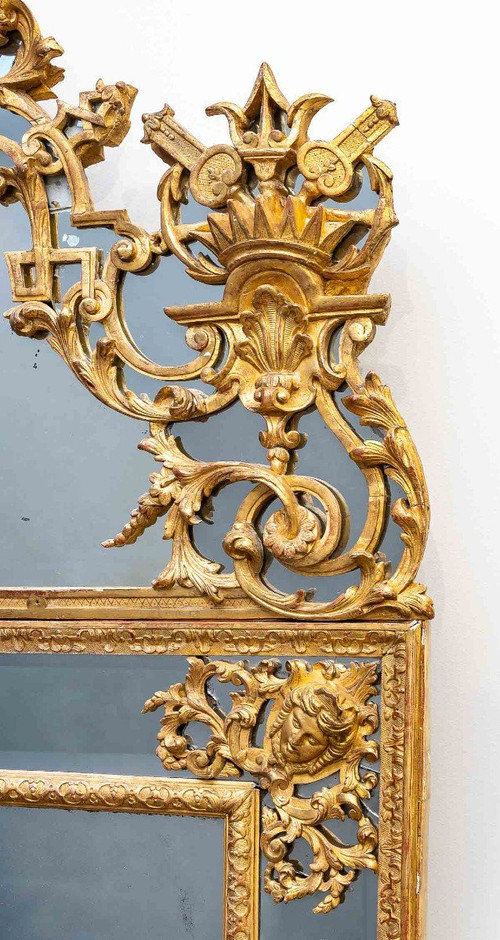 Important miroir à parcloses en bois doré  d'époque Louis XIV