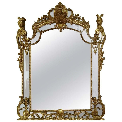 Eccezionale specchio in legno intagliato e dorato d'epoca Regence