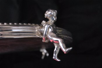 Besonders silberner Metalltisch mit vier Putten Putti XIX
