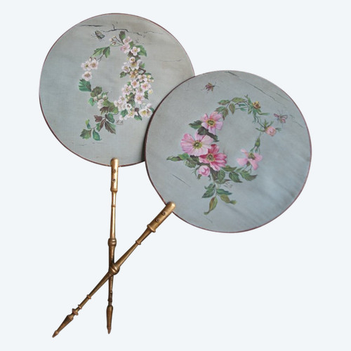 Pair of round hand screens, painting on silk signed LB, 19th century