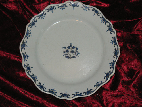 Lille earthenware plate, early 18th century, floral design