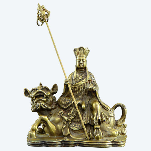 Giappone, XIX secolo, Gruppo in bronzo Bodhisattva Ksitigarbha seduto su un Kirin.