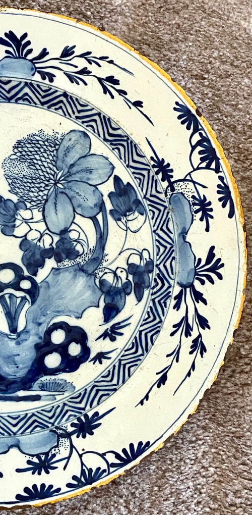 Delft, XVIIIth Century, Earthenware Dish Decorated With A Flowery Rock.