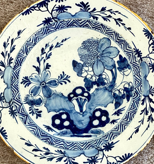 Delft, XVIIIth Century, Earthenware Dish Decorated With A Flowery Rock.