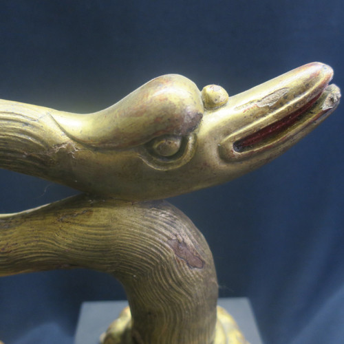 Two swan heads in gilded wood